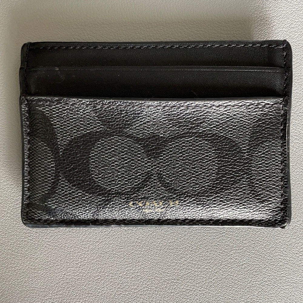 Men’s Coach 3 pocket Wallet with clear back.